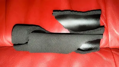 Torn pull-up bar handle grip made of foam 