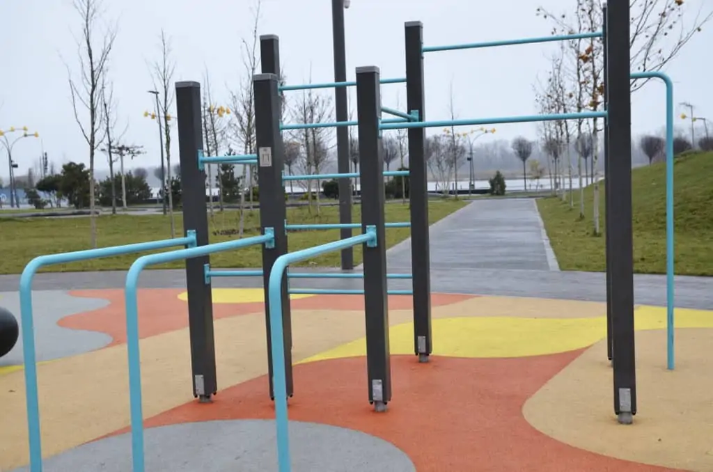 outdoor calisthenics park with rubber flooring